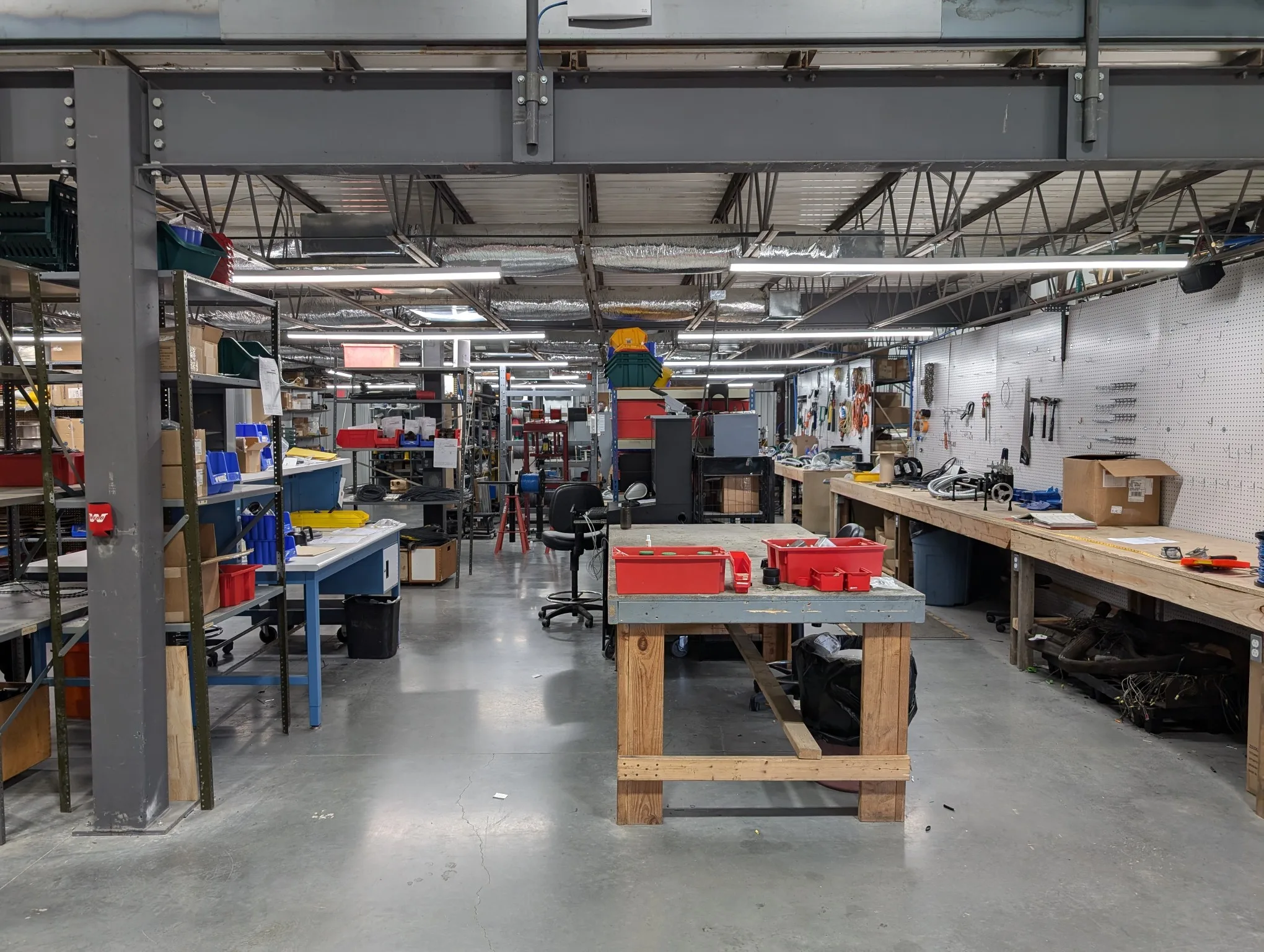 Eastern Connector warehouse entrance with inventory shelving and workstations