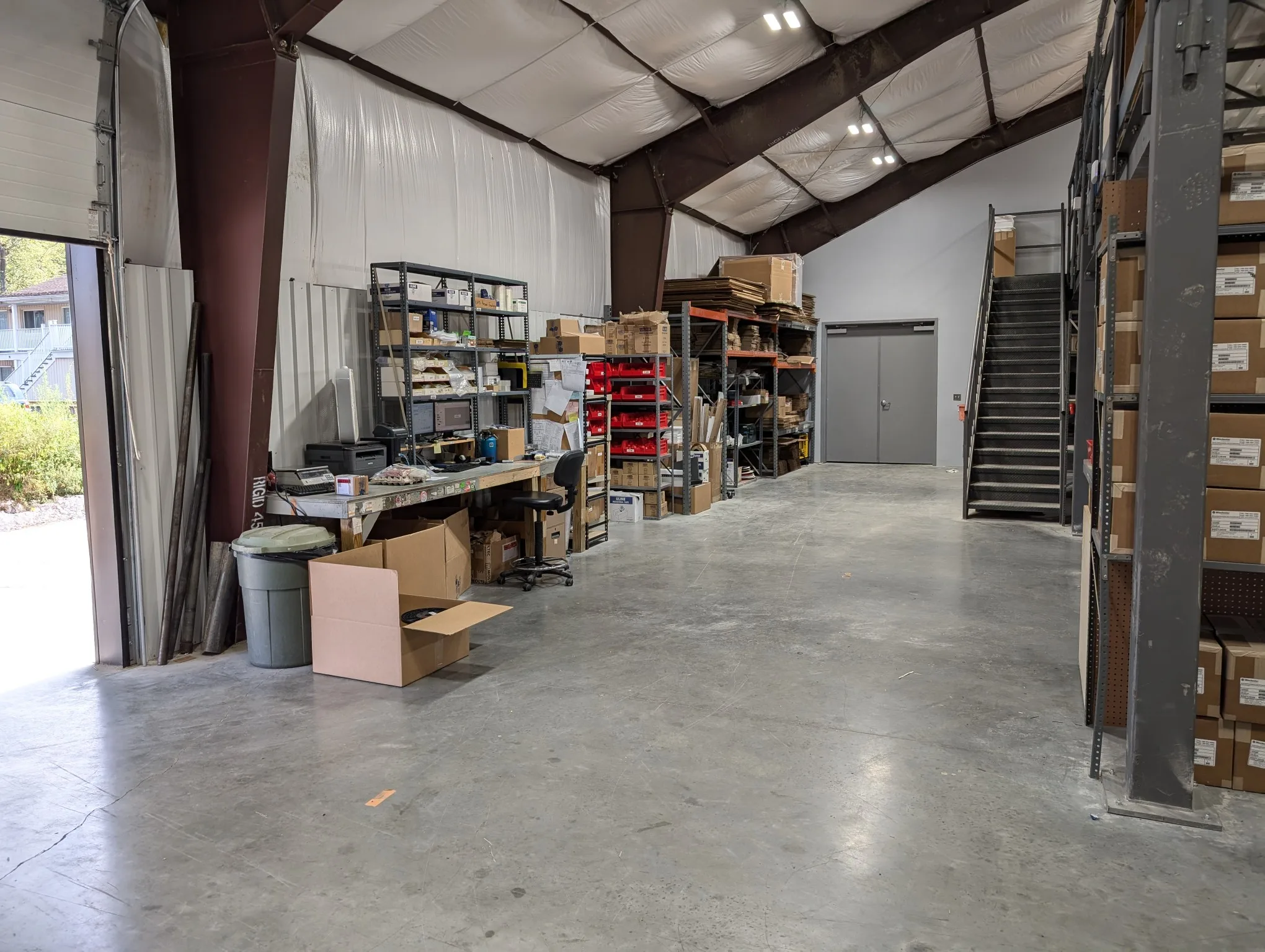 Eastern Connector assembly floor with benches, tooling, and parts bins